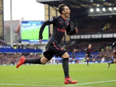 Premier League: Mesut Ozil inspires Arsenal fightback as team register emphatic win over 10-man Everton
