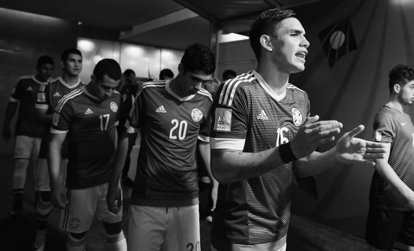 Anibal Vega of Paraguay spurs on his team as they walk out against Turkey in Navi Mumbai. Getty Images