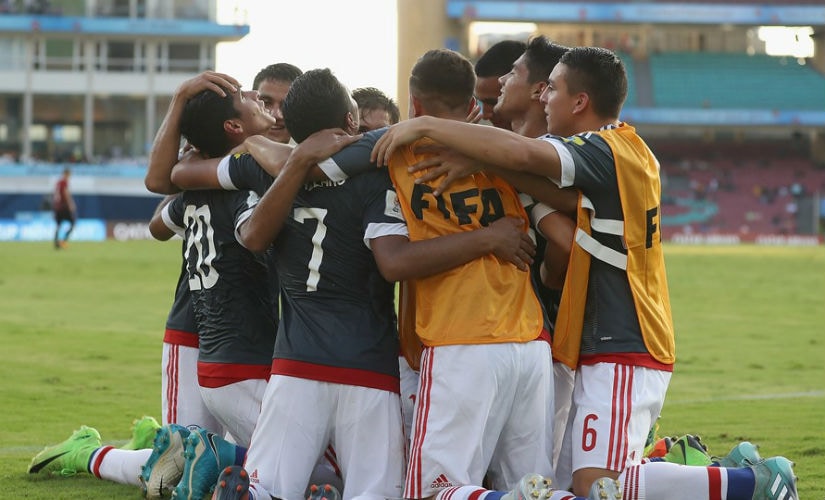 Paraguay players form a huddle after Giovanni Bogado scores a goal. Getty Images