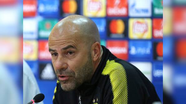 Champions League: Borussia Dortmund coach Peter Bosz admits team faces uphill task after Spurs-Madrid draw