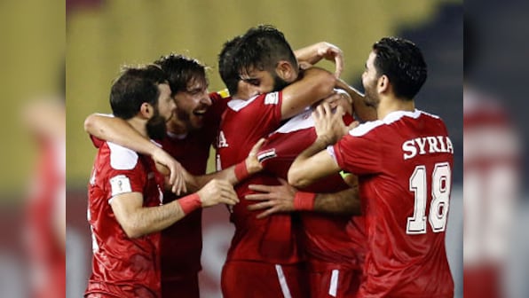 FIFA World Cup 2018 qualifiers: Syrian players hope to bring joy to war-torn homeland by reaching finals
