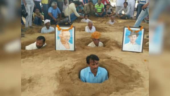 Zameen Samadhi Satyagraha: Why scores of farmers in a Rajasthan village are burying themselves in neck-deep pits