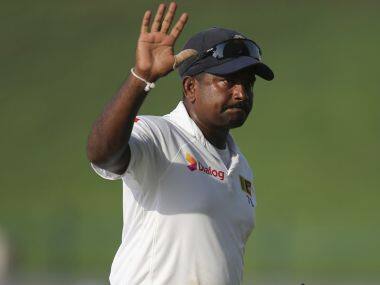 Sri Lanka’s bowler Rangana Herath waves after they beat Pakistan during their fifth day at First Test cricket match in Abu Dhabi, United Arab Emirates, Monday, Oct. 2, 2017. (AP Photo/Kamran Jebreili)
