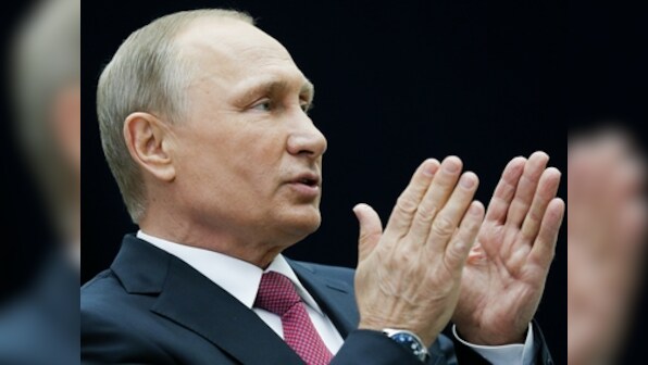 Vladimir Putin speaks at memorial to victim of purges, condemns Soviet-era political repressions