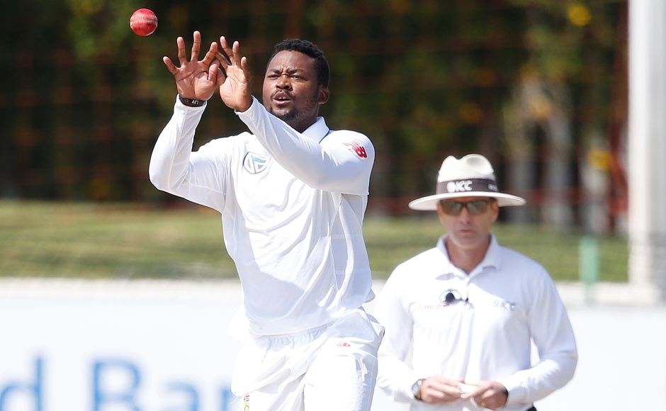 South African bowler Andile Pehlukwayo fields on his own bowling during the fifth day of the Test Match between South Africa and Bangladesh on October 2, 2017 in Potchefstroom. / AFP PHOTO / GIANLUIGI GUERCIA