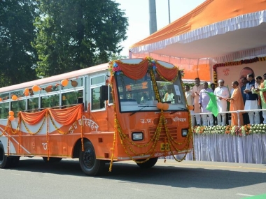 Painting UP saffron: Yogi Adityanath flags off saffron buses, continues imprinting BJP colour in state Painting UP saffron: Yogi Adityanath flags off saffron buses, continues imprinting BJP colour in state