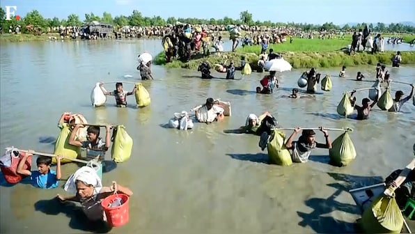 Ten drown as Rohingya boat sinks off Bangladesh, 12,000 more arrive