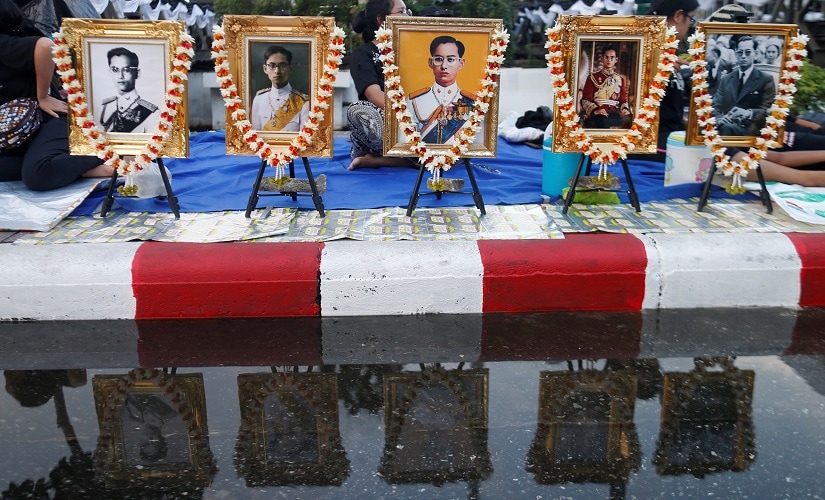 Pictures of late King Bhumibol Adulyadej are seen in Bangkok, Thailand. Reuters