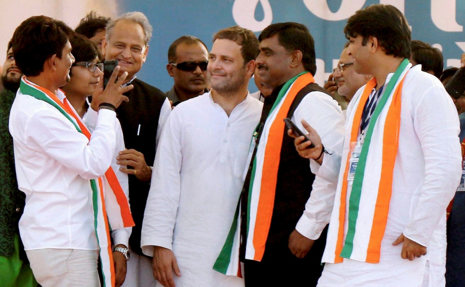 Congress vice-president Rahul Gandhi interacts with the OBC leader Alpesh Thakor who joined the party, during a public meeting in Gandhinagar, Gujarat on Monday. Party leader Ashok Gehlot is also seen. PTI Congress vice-president Rahul Gandhi interacts with the OBC leader Alpesh Thakor who joined the party, during a public meeting in Gandhinagar, Gujarat on Monday. Party leader Ashok Gehlot is also seen. PTI
