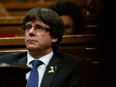 Catalan leader Carles Puigdemont could be offered asylum by Belgium, claims immigration minister