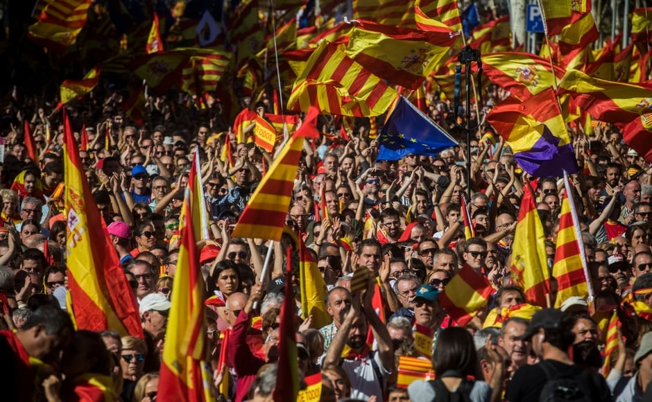 Pro-unity protesters gathered for a rally in Catalonia's capital Barcelona on Sunday, two days after regional lawmakers voted to break away from Spain. AP Pro-unity protesters gathered for a rally in Catalonia's capital Barcelona on Sunday, two days after regional lawmakers voted to break away from Spain. AP