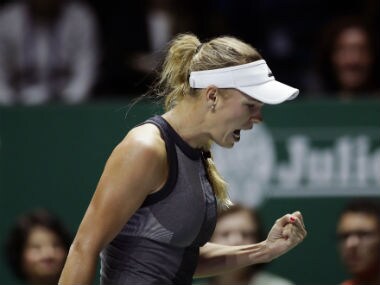 WTA Finals: Caroline Wozniacki prevails against Karolina Pliskova, Simona Halep ends season as World No 1