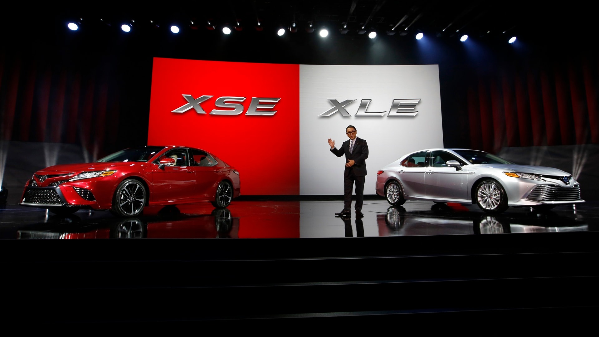 Akio Toyoda, president of Toyota Motor Corporation, introduces the 2018 Camry XSE (L) and the 2018 Camry XLE during the North American International Auto Show in Detroit, Michigan, U.S., January 9, 2017. REUTERS/Mark Blinch - HT1ED191F86B0