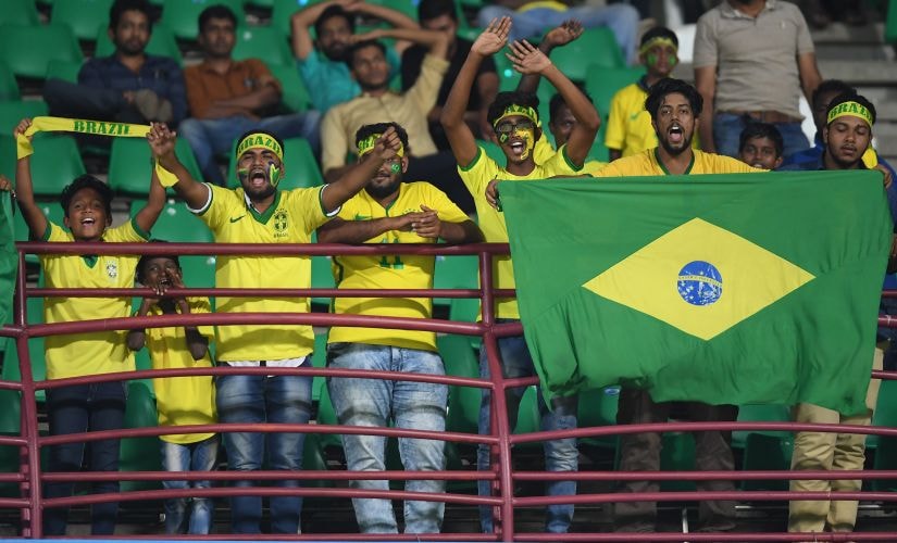 Brazil fans celebrate at the end of their team's FIFA U-17 World Cup Round of 16 win over Honduras in Kochi. Getty Images