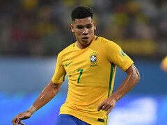 Soccer player Paulinho won't let intolerance of his Afro-Brazilian