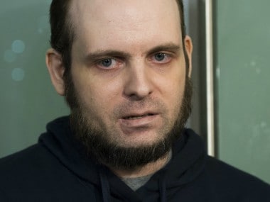 Joshua Boyle speaks to the media after arriving at the Pearson International Airport in Toronto on Friday. AP