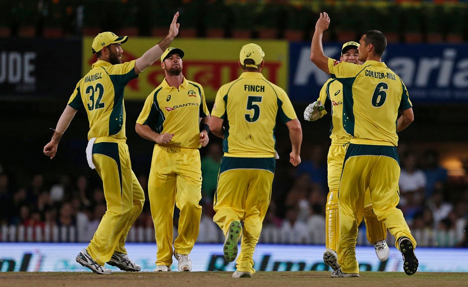 Australia pacer Nathan Coulter-Nile struck early to see the back of Rohit Sharma for 11. AP Australia pacer Nathan Coulter-Nile struck early to see the back of Rohit Sharma for 11. AP
