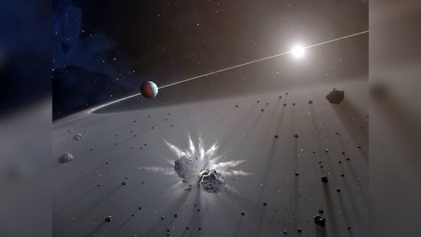 Giant exoplanets more likely to be in orbit around stars with debris disks: Study