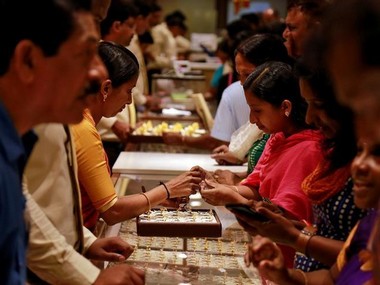 Gold likely to surge up to Rs 42,000 by December-end as geopolitical uncertainties, weak rupee push prices, say analysts Gold likely to surge up to Rs 42,000 by December-end as geopolitical uncertainties, weak rupee push prices, say analysts