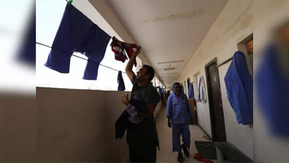 Qatar steps up efforts to protect migrant workers' rights, but activists are not celebrating just yet