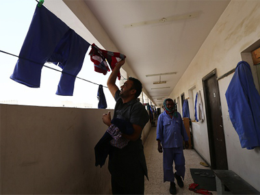 Qatar steps up efforts to protect migrant workers' rights, but activists are not celebrating just yet Qatar steps up efforts to protect migrant workers' rights, but activists are not celebrating just yet