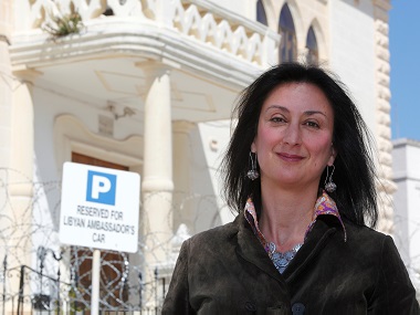 Malta PM says slain blogger was biggest adversary but vows to bring her killers to justice Malta PM says slain blogger was biggest adversary but vows to bring her killers to justice