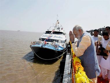 Narendra Modi inaugurates ferry service in Ghogha, slams UPA for creating hurdles for project Narendra Modi inaugurates ferry service in Ghogha, slams UPA for creating hurdles for project
