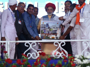 Narendra Modi in Gujarat: PM backs GST and note ban, slams Congress for thwarting state's development Narendra Modi in Gujarat: PM backs GST and note ban, slams Congress for thwarting state's development