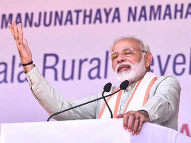 Narendra Modi says people in Karnataka do not want to wait for poll, says they are "anxious" to join race for development Narendra Modi says people in Karnataka do not want to wait for poll, says they are "anxious" to join race for development