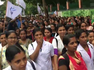 A file image of nurses in Kerala taking part in a protest march. Firstpost.