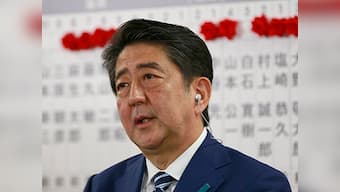 Japan PM Shinzo Abe says his victory represents 'historic' public confidence in his policy decisions
