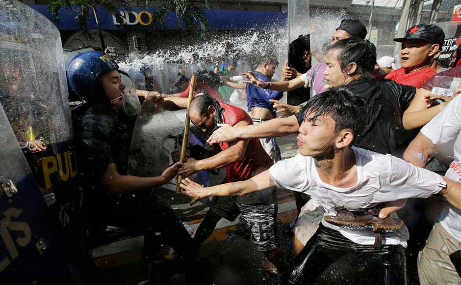 Riot police used water cannons to prevent hundreds of protesters reaching the US embassy in Manila on Sunday, just a few hours before the arrival of US president Donald Trump in the Philippines for a regional summit and the last leg of his Asia tour. AP Riot police used water cannons to prevent hundreds of protesters reaching the US embassy in Manila on Sunday, just a few hours before the arrival of US president Donald Trump in the Philippines for a regional summit and the last leg of his Asia tour. AP