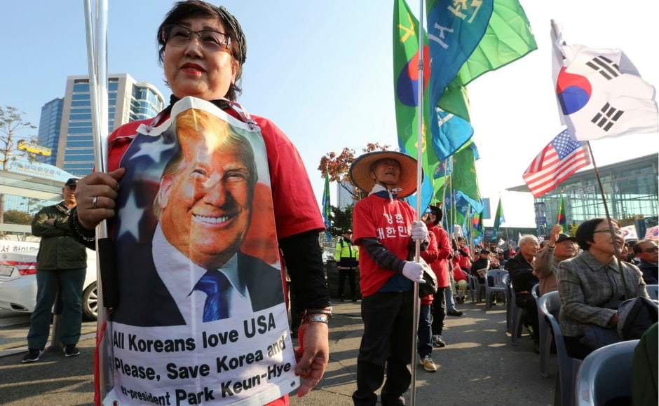 The pro-Trump supporters, some of whom were wearing military uniforms, urged Washington to help South Korea. AP The pro-Trump supporters, some of whom were wearing military uniforms, urged Washington to help South Korea. AP