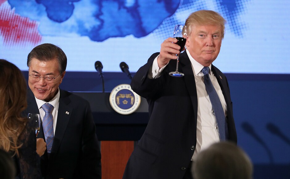 Along with the South Korean president Moon Jae-in, he raised a toast at the start of a dinner at the Blue House in Seoul. AP Along with the South Korean president Moon Jae-in, he raised a toast at the start of a dinner at the Blue House in Seoul. AP