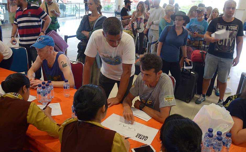 Ten alternative airports have been prepared for airlines to divert inbound flights, including in neighbouring provinces, the airport operator said, adding it was helping people make alternative bookings and providing food and entertainment for stranded travellers. Passengers talk to ground crew as their flights are cancelled at Ngurah Rai International Airport. AP Ten alternative airports have been prepared for airlines to divert inbound flights, including in neighbouring provinces, the airport operator said, adding it was helping people make alternative bookings and providing food and entertainment for stranded travellers. Passengers talk to ground crew as their flights are cancelled at Ngurah Rai International Airport. AP