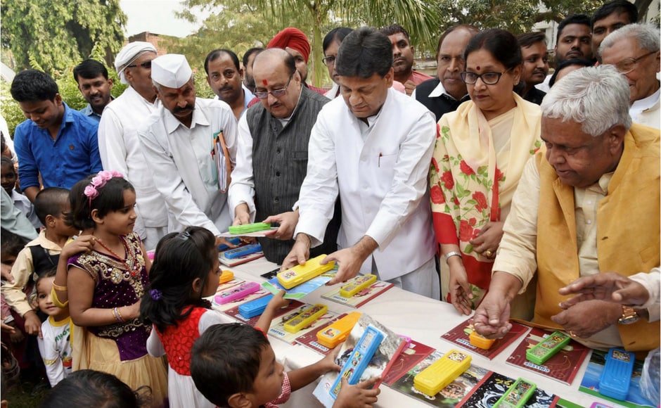 In Bihar, books and other stationery items were distributed to slum children. PTI In Bihar, books and other stationery items were distributed to slum children. PTI