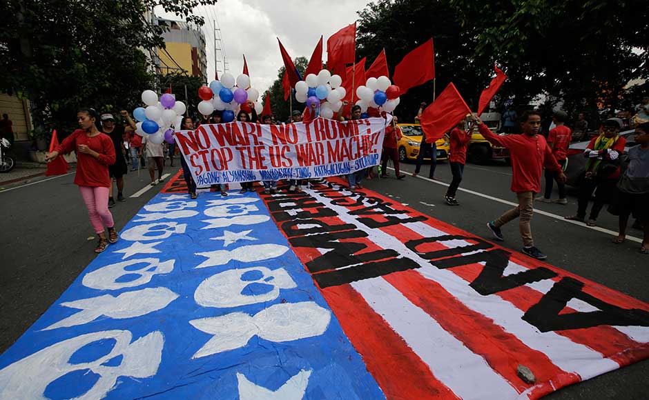 Trump will meet Philippine President Rodrigo Duterte in Manila, where he will try to shore up relations strained by the mercurial Duterte’s notorious anti-US sentiment and his enthusiasm for better ties with Russia and China. Protesters walk on a giant mock US flag during a rally near the venue of ASEAN summit and meetings in Manila. AP Trump will meet Philippine President Rodrigo Duterte in Manila, where he will try to shore up relations strained by the mercurial Duterte’s notorious anti-US sentiment and his enthusiasm for better ties with Russia and China. Protesters walk on a giant mock US flag during a rally near the venue of ASEAN summit and meetings in Manila. AP