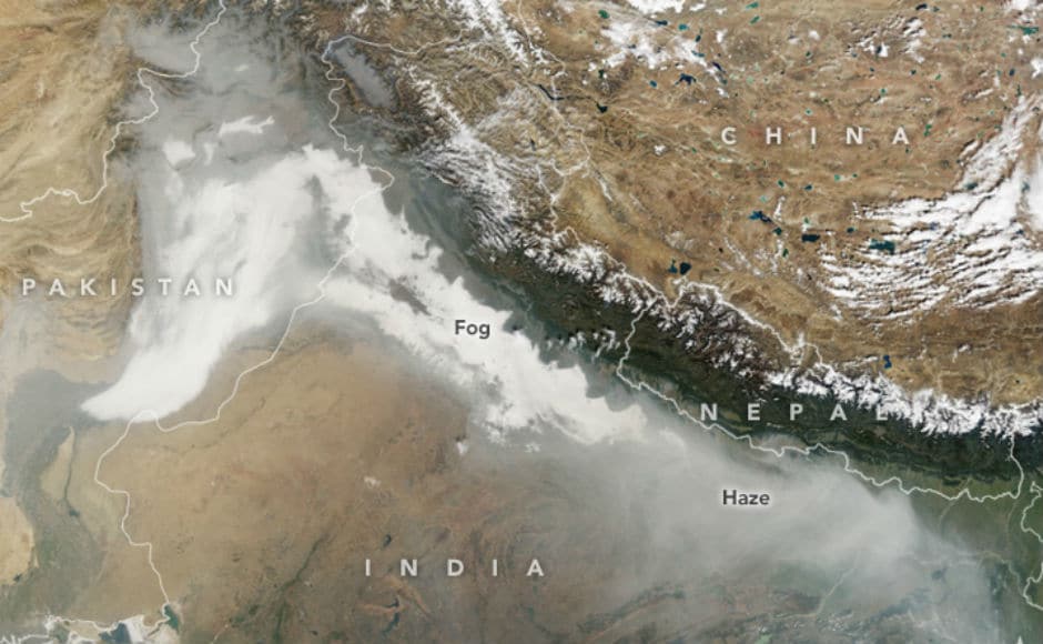 Delhi continued to witness high pollution levels on Friday, as thick smog covered the city. NASA released images showing the extent of smog and fog enveloping northern India and parts of Pakistan. Image courtesy: earthobservatory.nasa.gov Delhi continued to witness high pollution levels on Friday, as thick smog covered the city. NASA released images showing the extent of smog and fog enveloping northern India and parts of Pakistan. Image courtesy: earthobservatory.nasa.gov