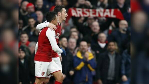 Premier League: Arsene Wenger hails Mesut Ozil's 'fight' after Arsenal thrash Huddersfield Town