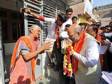 BJP president Amit Shah on his door-to-door campaign in Gujarat. Twitter @AmitShah