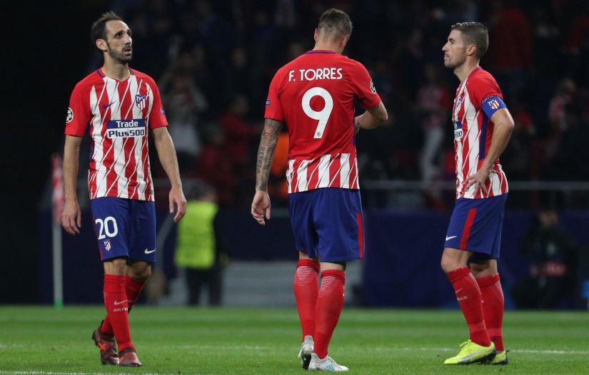 Soccer Football - Champions League - Atletico Madrid vs Qarabag FK - Wanda Metropolitano, Madrid, Spain - October 31, 2017 Atletico Madrid's Fernando Torres, Juanfran and Gabi look dejected after the match REUTERS/Sergio Perez - RC1A12F71450
