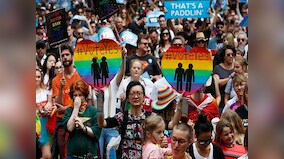 Australian MP proposes to gay partner in Parliament moments before bill to legalise same-sex marriage is introduced