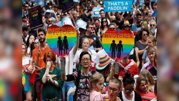 Australian MP proposes to gay partner in Parliament moments before bill to legalise same-sex marriage is introduced