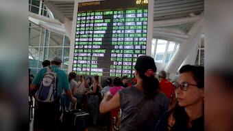 Bali airport to reopen today after three-day shutdown as volcanic ash shifts direction away from flight path