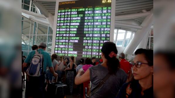 Bali airport to reopen today after three-day shutdown as volcanic ash shifts direction away from flight path