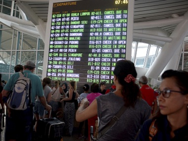 Bali airport to reopen today after three-day shutdown as volcanic ash shifts direction away from flight path Bali airport to reopen today after three-day shutdown as volcanic ash shifts direction away from flight path
