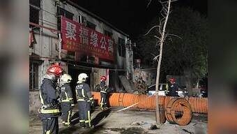 Chinese state media says 19 dead, 8 injured in Beijing fire; suspects in custody