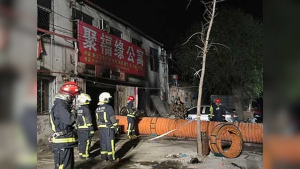 Chinese state media says 19 dead, 8 injured in Beijing fire; suspects in custody