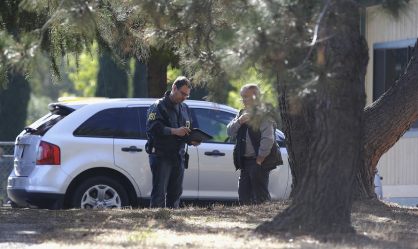 Law enforcement officers at an elementary school in Rancho Tehama Reserve, where a gunman opened fire. AP
