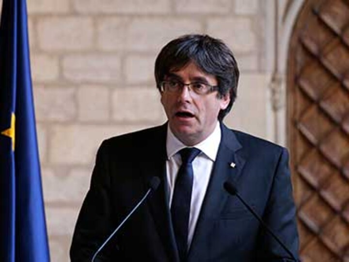 Catalan leader Carles Puigdemont calls on Spain government to grant him permission to return home